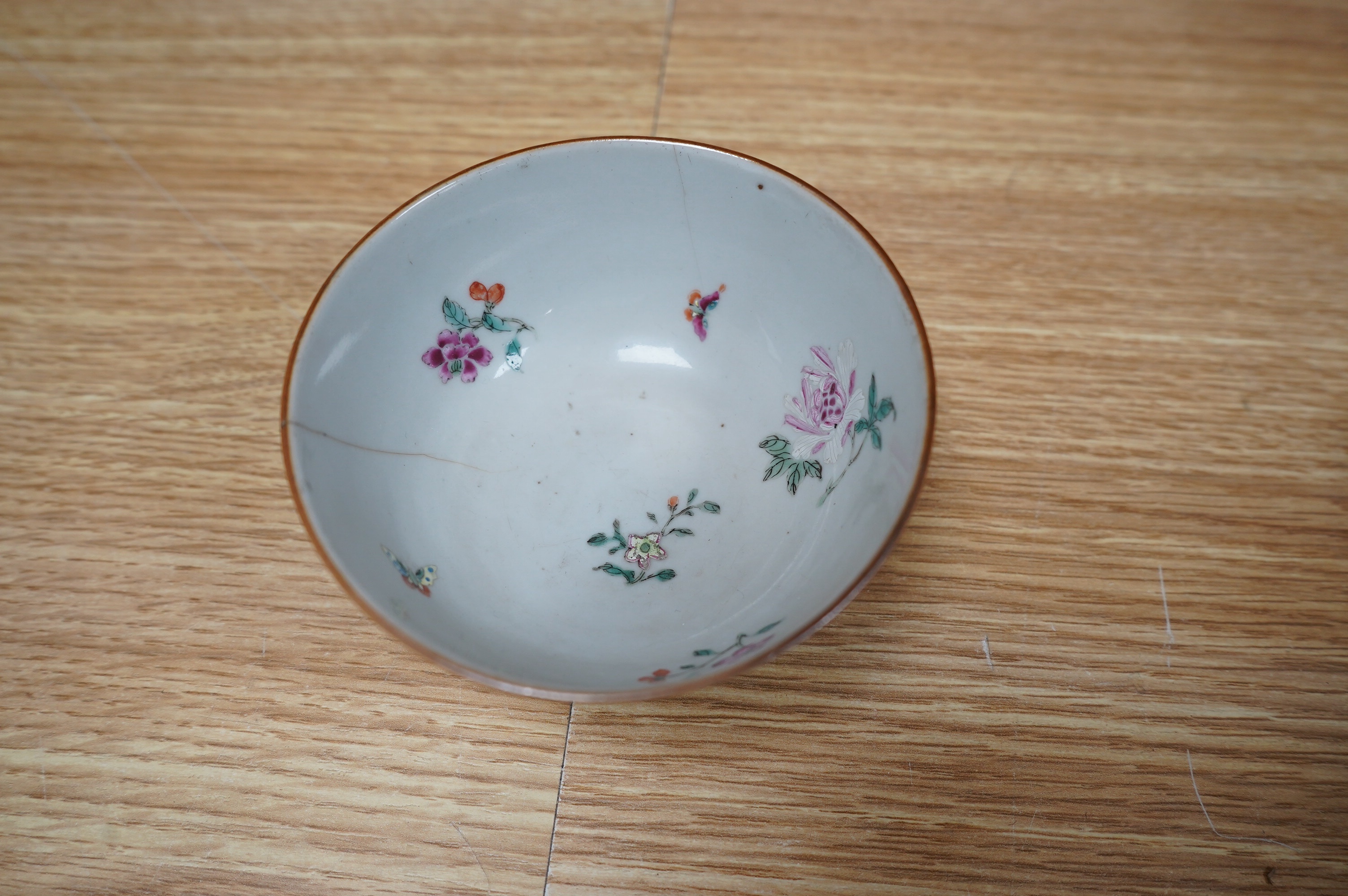 Three small 18th century Chinese export porcelain dishes, three bowls and a cup, largest 14cm. Condition - poor